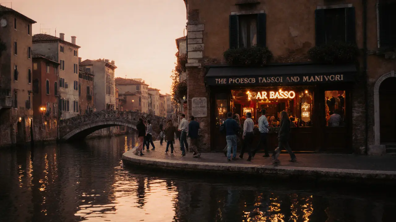 Early morning crowd walking past Bar Basso and canal cafés as sunrise lights the Navigli district.