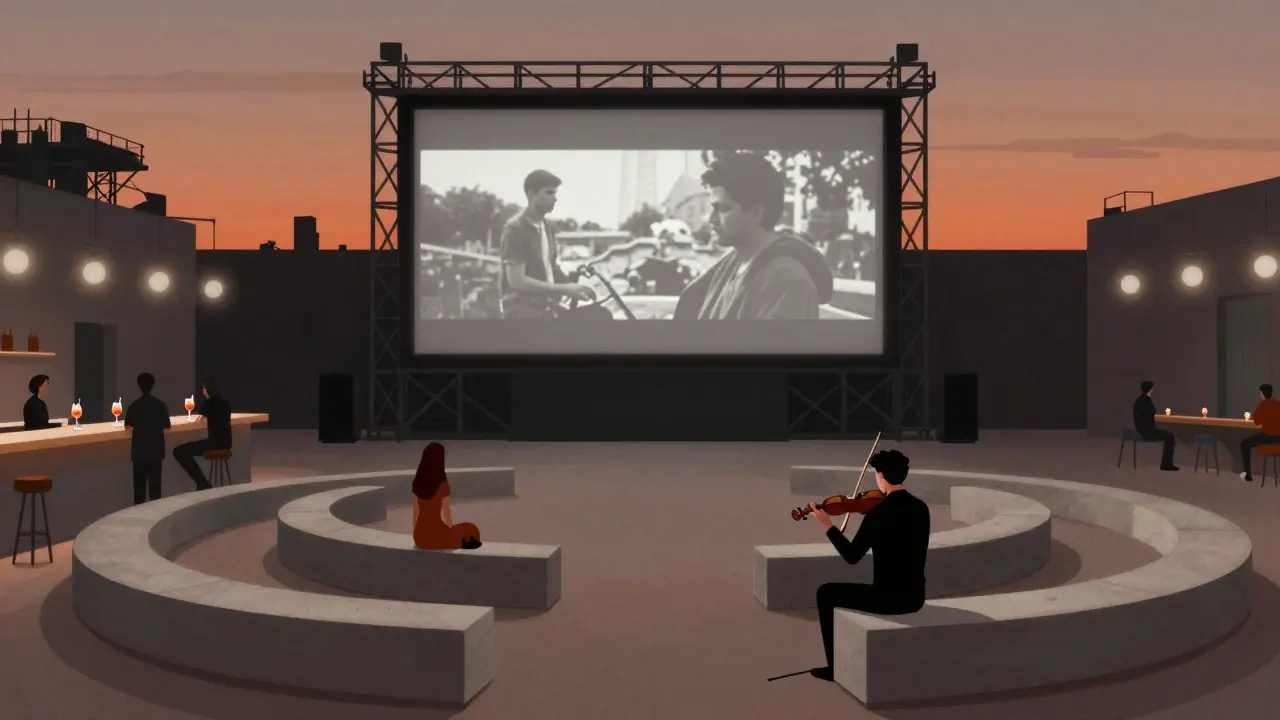 Minimalist outdoor cinema in a modern courtyard, guests sipping drinks as a film projects onto a steel-framed screen.
